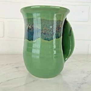 Neher Signed Clay In Motion Hand Warmer Mug Cup